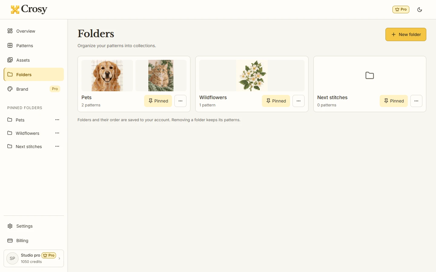 Dashboard Folders directory showing New folder, pinned-first cards and folder actions.