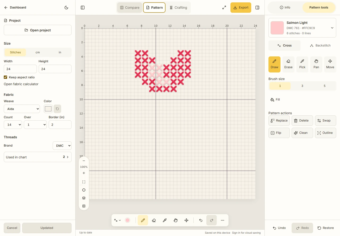 Actual Pattern workspace after drawing the red bloom and six pale pink highlight Crosses, before adding the stem and pot.